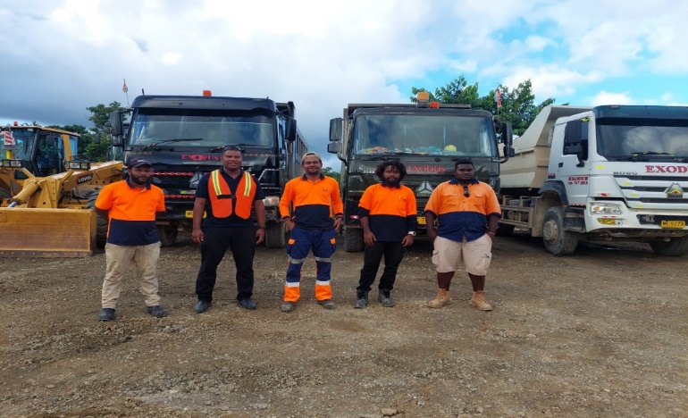 ETDL team members standing together on a construction site